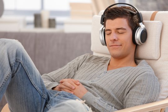 Young Man Relaxing With Headphones