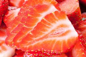 Sliced strawberries .
