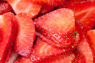 Sliced strawberries .