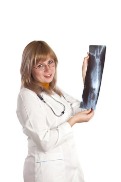 Smiling medical doctor woman with stethoscope and X-ray picture