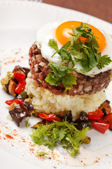 beef burger with egg and potatoes