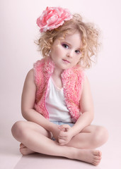 Obraz na płótnie Canvas little girl in fashion clothes