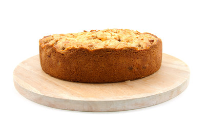 Apple pie on wooden shelf over white background