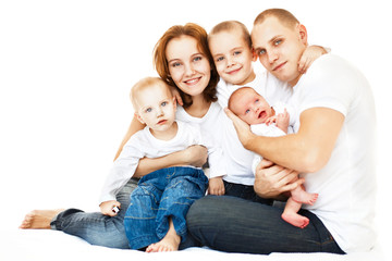 Happy young family over white