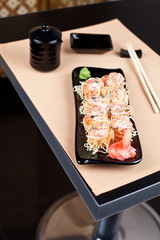 Table place setting with sushi roll