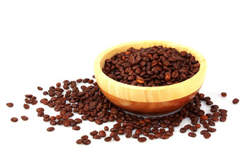 Plate with coffee beans isolated on white