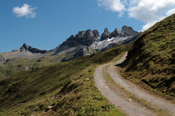 Autumn mountain ridge and snow on mountainside in Swiss Alps
