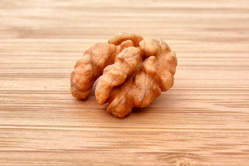 Closeup of a walnut on wooden table