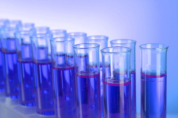 Test-tubes on blue background