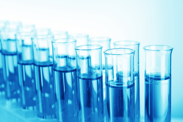 Test-tubes on blue background