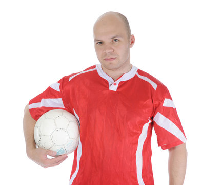 Football player with the ball in his hands.