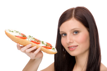 Healthy lifestyle - woman enjoy caprese sandwich