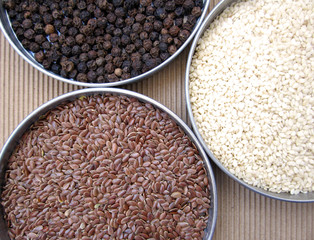 variety of spices in metal bowls