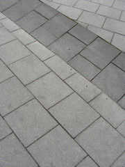 interesting tile pattern on sidewalk in the city