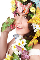 Girl with butterfly and flower on head. © Gennadiy Poznyakov