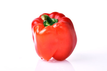 A fresh red pepper isolated on the white background.