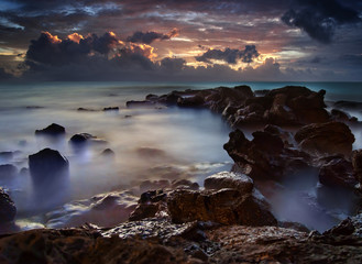 Dramatic Ocean Sea with Dark Purple Clouds