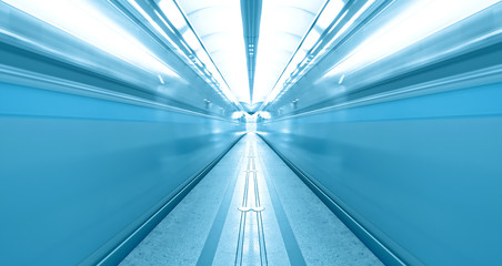 Fast moving trains on underground platform