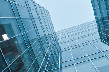 Obraz premium prospective view to new modern building skyscrapers
