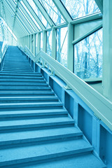 Fototapeta premium perspective staircase inside yellow corridor