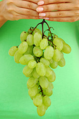 grape in woman hands