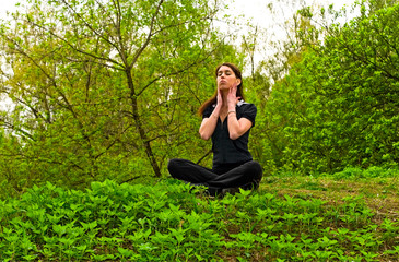 young woman in meditation pose