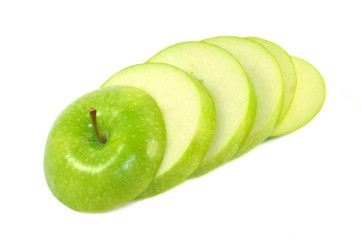 Tasty slices of green apple isolated on a white background