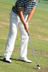 Obraz premium Man playing golf
