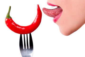 eine rote Peperoni mit Zunge