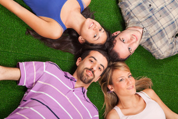 Young People Lying on the Ground