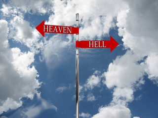 Road sign in the heaven and hell against the sky
