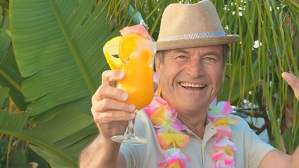 Aged man with a cocktail - Powered by Adobe