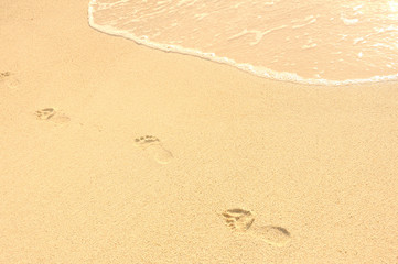 Footprints in Sand on Beach