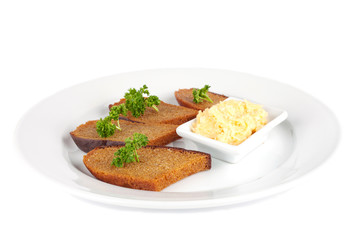 pieces of toasted bread with cheese dip