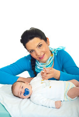 Attractive mother with newborn baby