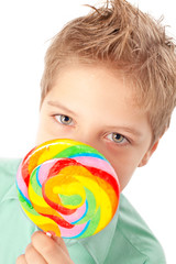Fototapeta na wymiar Cute boy with lollypop