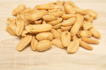 Salted Peanuts on Wood Board