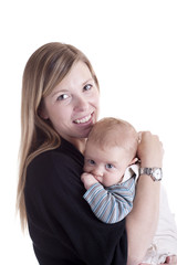 mother holding baby tenderly