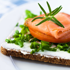 Freshly prepared sandwich with smoked salmon and chive