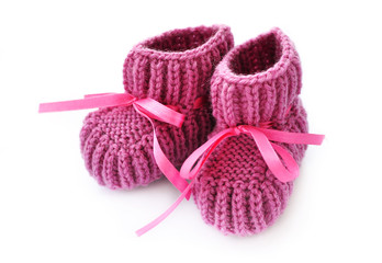 Purple knitted baby booties