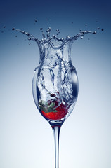 Strawberry in a glass with water.