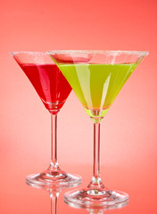 Martini glasses on red background