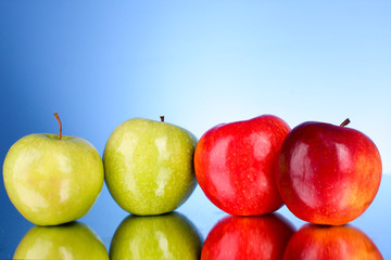 Apples on blue background