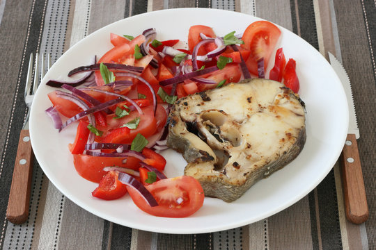 fried forkbeard with salad