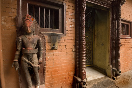 Stone Deity  front of temple at Patan Durbar Square, Nepal.1.