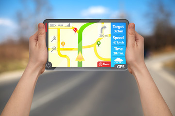 a male hand holding a gps