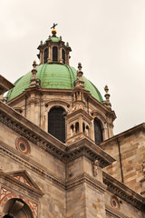 Fototapeta na wymiar Como cathedral dome, Italy close-up view.