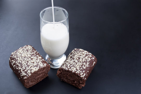 chocolate roll and a glass of milk
