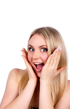 Beautiful young woman is joyfully surprised