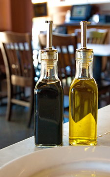 Balsamic Vinegar and Olive Oil on Table